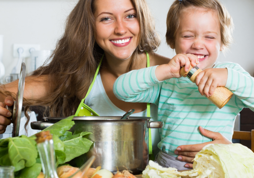 child helping cook